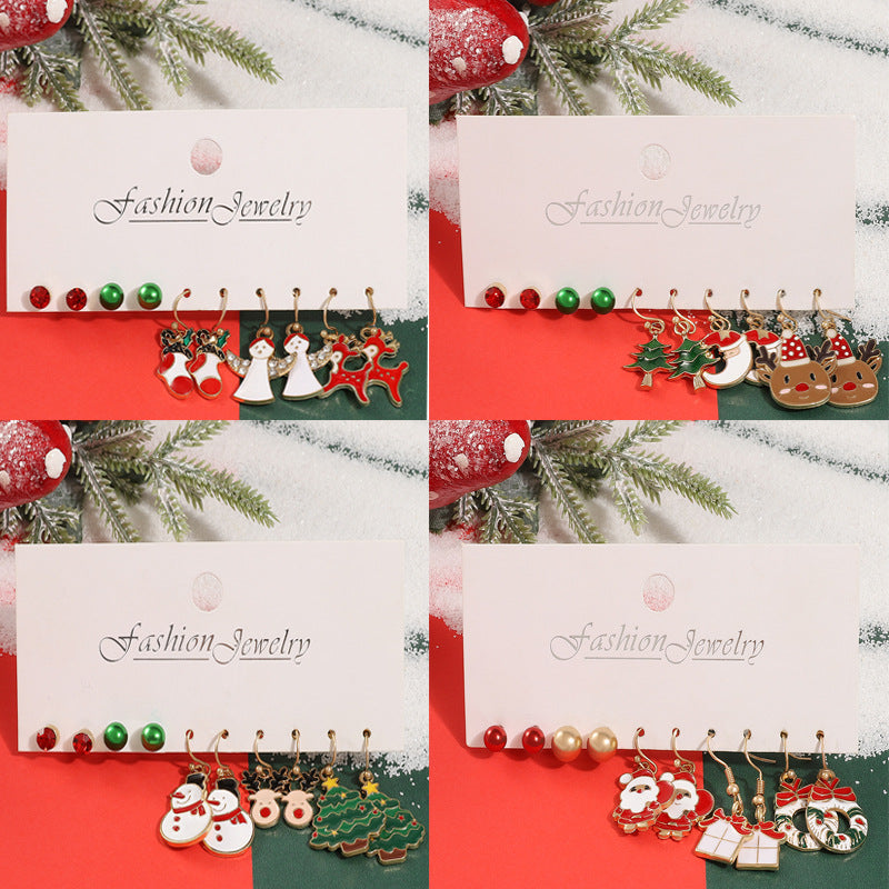 Juego de pendientes de aleación con temática navideña para mujer con dijes esmaltados de ciervo y Papá Noel, diseño geométrico, acabado chapado