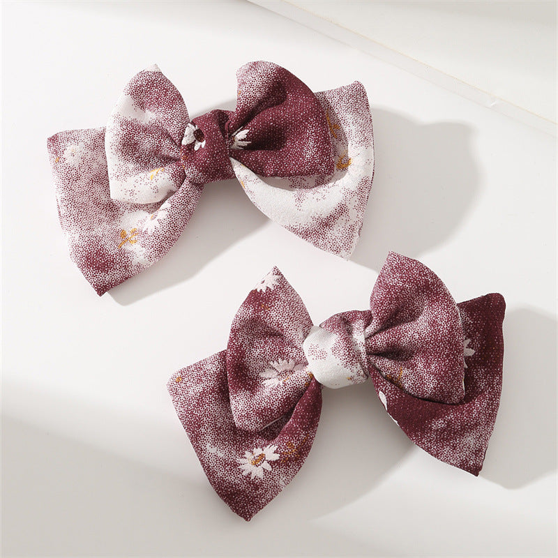 Set de pinzas para el cabello florales pastel dulces para niñas con diseño de tela en forma de moño en estilo ligero de lujo