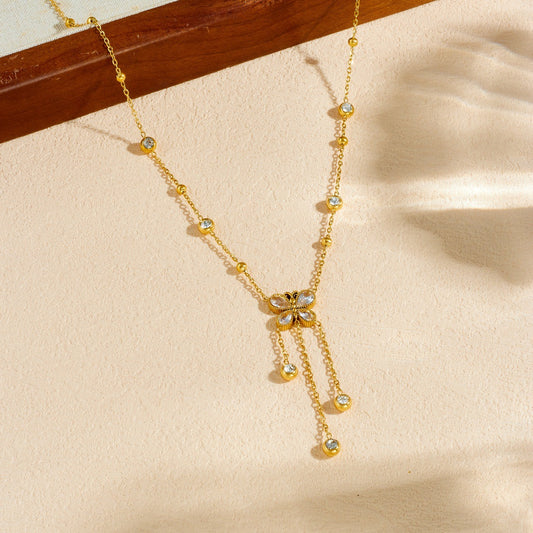 Minimalist Gold Plated Stainless Steel Butterfly Teardrop Pendant Necklace with Rhinestone Inlay and Tassel Chain for Women