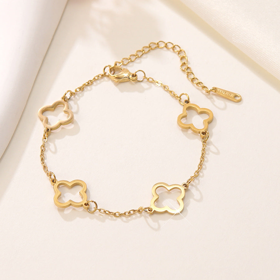 Elegante Bracciale Minimalista da Donna in Acciaio Inossidabile Placcato Oro con Zirconi e Quadrifoglio