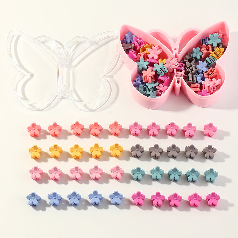 Fermaglio per capelli in plastica a forma di fiore per bambini con finitura smaltata in colori caramella