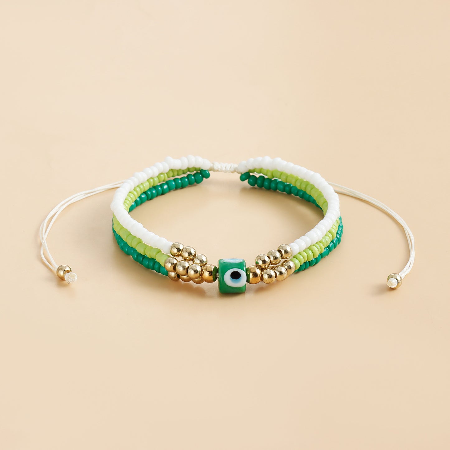 Elegante bracciale da donna in metallo galvanizzato a forma di occhio con intreccio di perline colorate