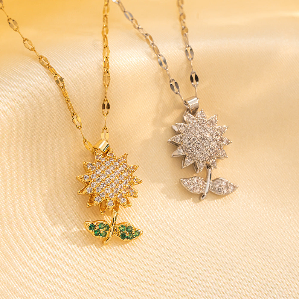 Collar con colgante de girasol geométrico para mujer con diseño de hojas verdes giratorias de doble capa en acero de titanio con incrustaciones de diamantes de imitación y cadena ondulada