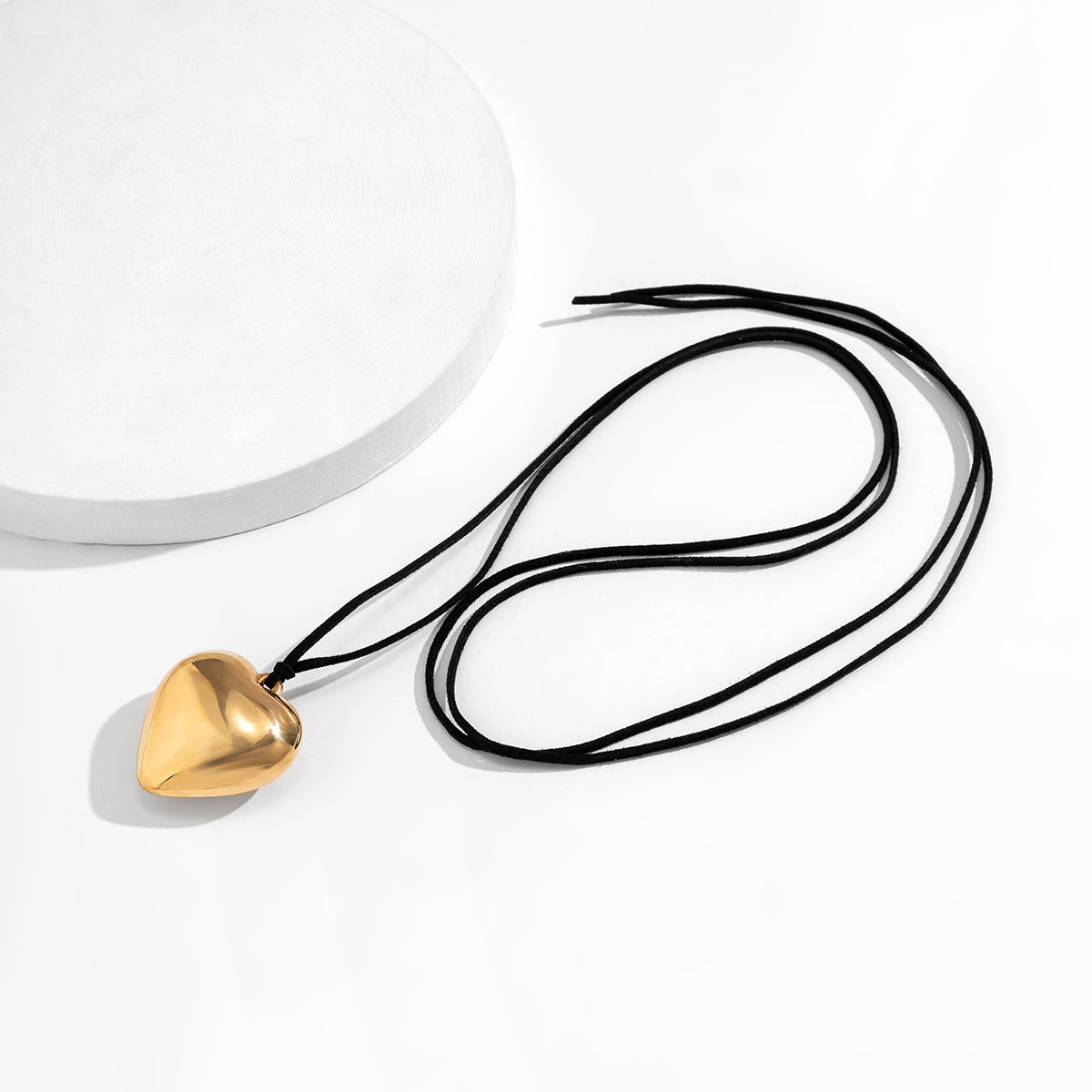 Sweet and Edgy Heart-Shaped Alloy Pendant Necklace with Plated Finish, Long Tassel Design on Velvet Wax Cord for Women