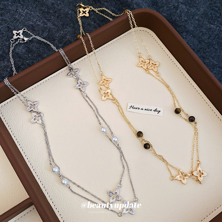 Collana pendente floreale da donna minimalista ed elegante con occhio di tigre e perle, in lega placcata oro, stile catena per maglione, per tutti i giorni
