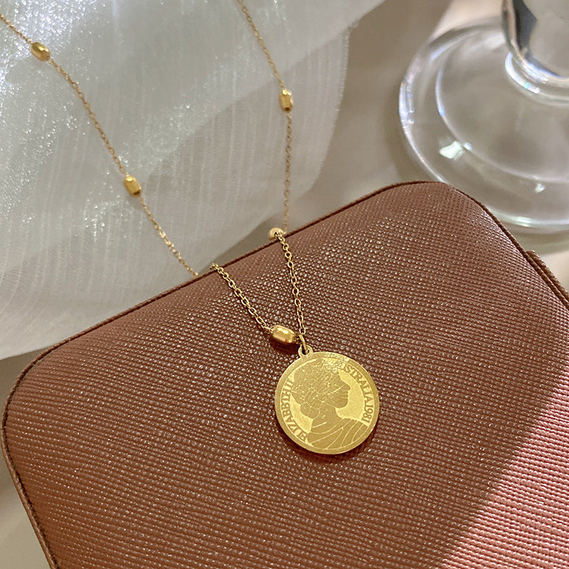 New Chinese Style Gold Plated Titanium Steel Round Pendant Necklace with Geometric Relief Design for Unisex