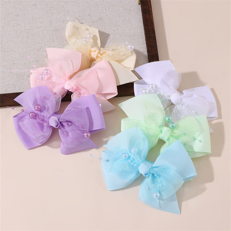 Graziosa molletta per capelli coreana per bambine con fiocco, design a rete arricciata 3D, forcina in resina plastica a becco d'anatra di colore rosa