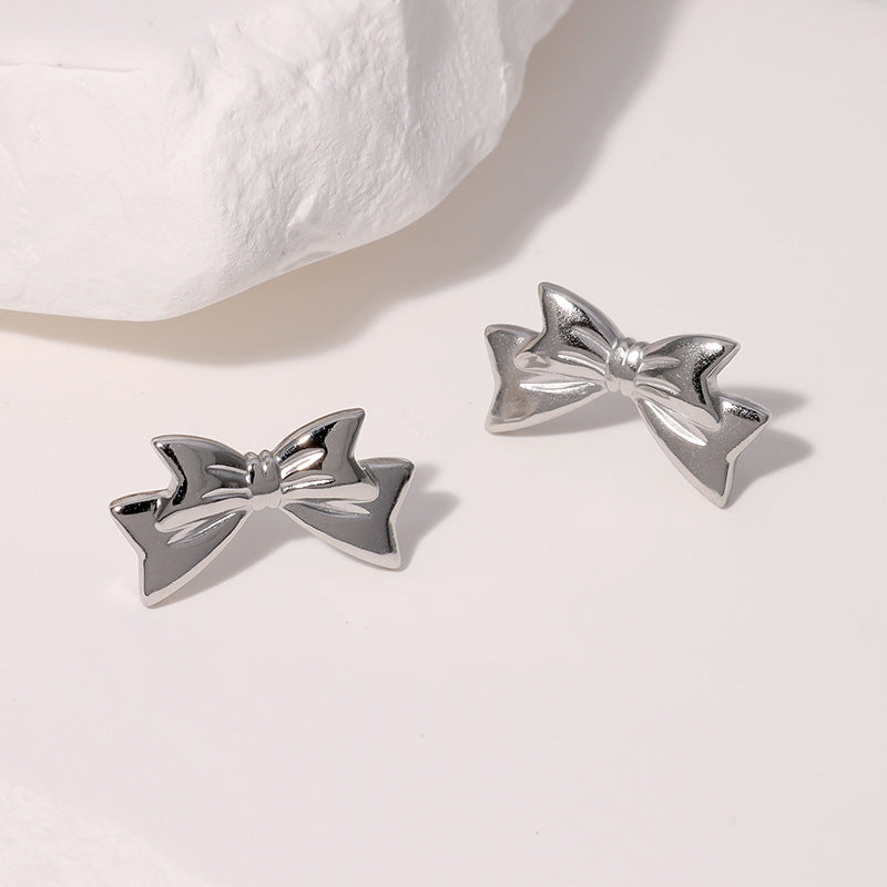 Pendientes de acero inoxidable en forma de lazo de moda minimalista con baño de oro para mujer