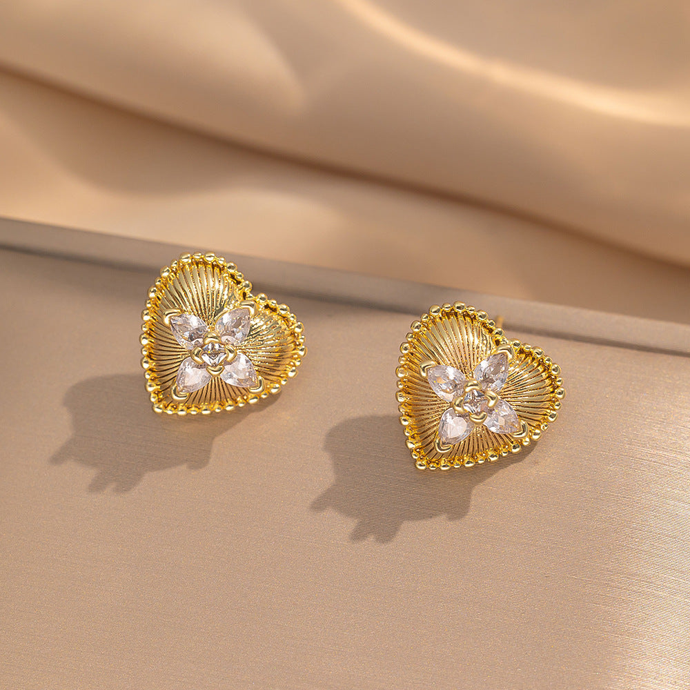 Orecchini a perno Saturno minimalisti color oro in ottone con zirconi per donna
