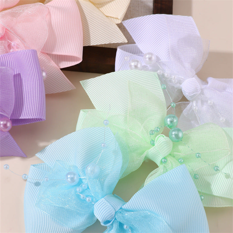 Graziosa molletta per capelli coreana per bambine con fiocco, design a rete arricciata 3D, forcina in resina plastica a becco d'anatra di colore rosa
