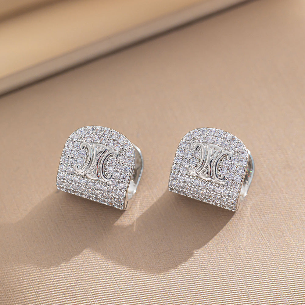 Orecchini a perno geometrici minimalisti da donna in ottone placcato oro 18 carati con intarsi in strass