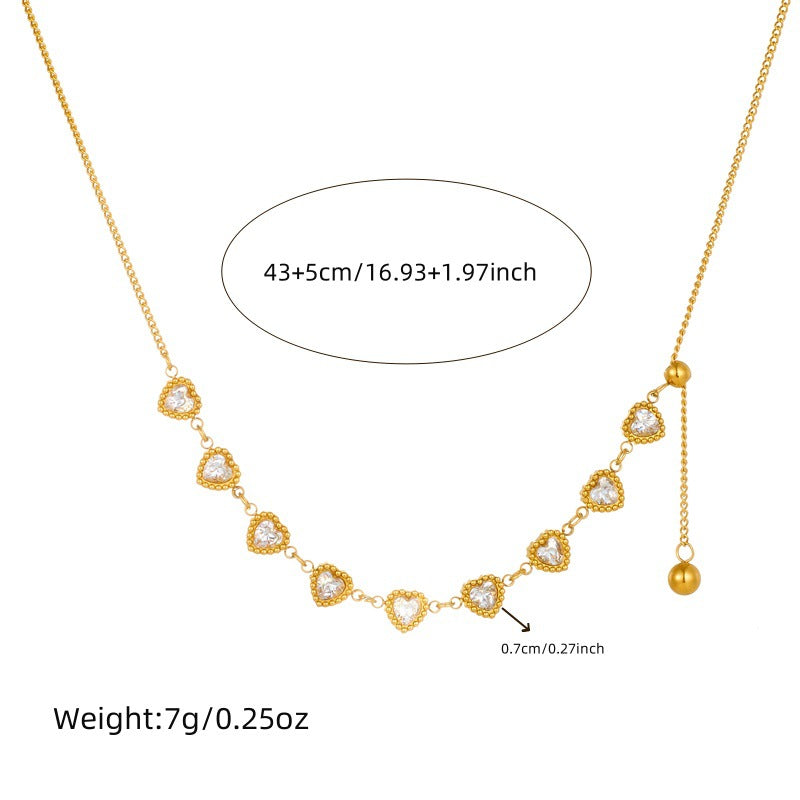 Minimalist Plated Stainless Steel Heart Pendant Necklace with Rhinestone Accents and Long Tassel Chain