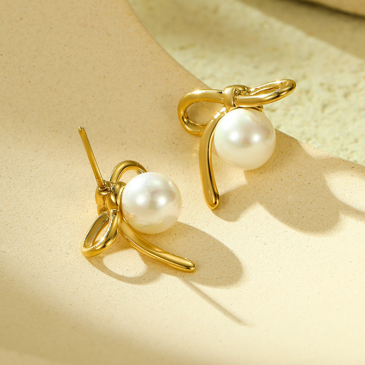 Minimalist Bow-Shaped Titanium Steel Stud Earrings with Pearl Inlay for Women, Hypoallergenic and Fade-Resistant
