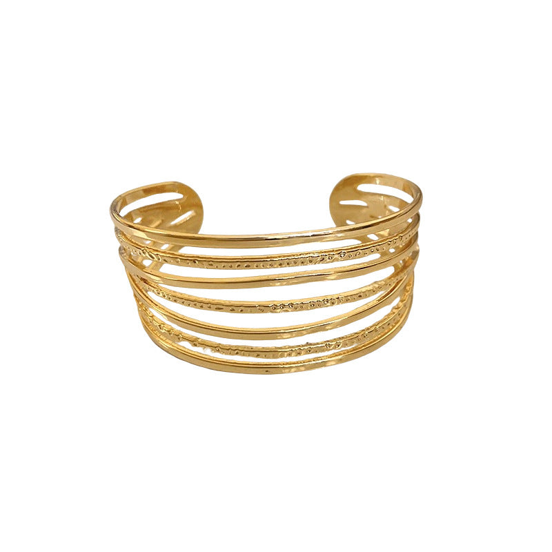 Bracciale rigido aperto geometrico minimalista in lega con finitura placcata per donna