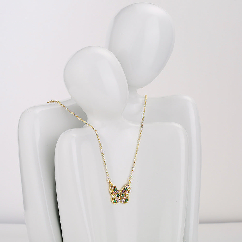 Minimalist Butterfly-Shaped Geometric Pendant Necklace for Women with Gold-Plated Copper Base and Micro-Paved Zirconia and Pearl Accents