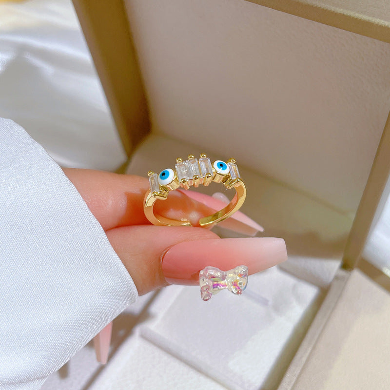 Anello Minimalista Aperto a Corona in Ottone Placcato Oro con Intarsio in Zirconi per Donna
