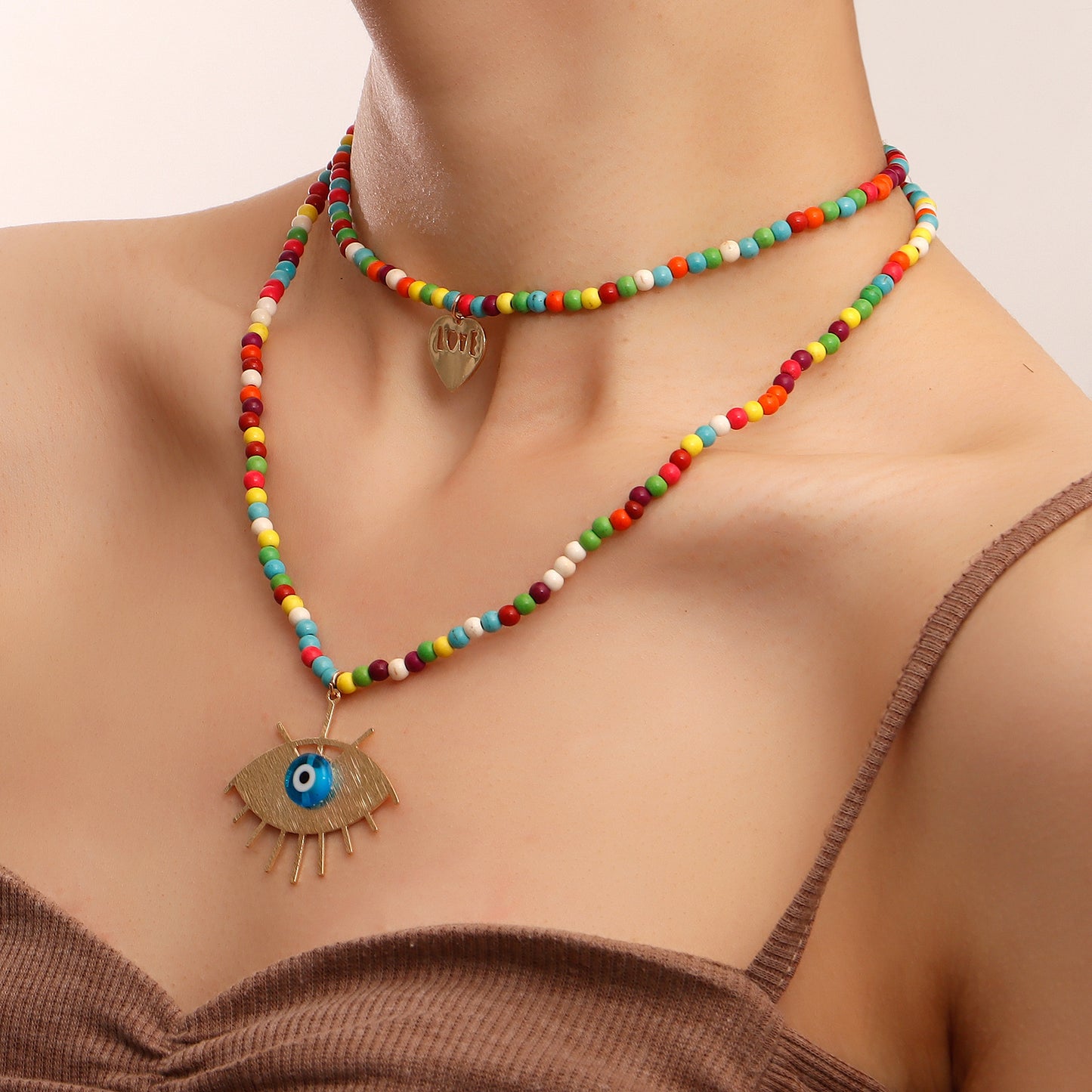 Collana con ciondolo a strati da donna in turchese geometrico con occhio di demone e catena in lega placcata