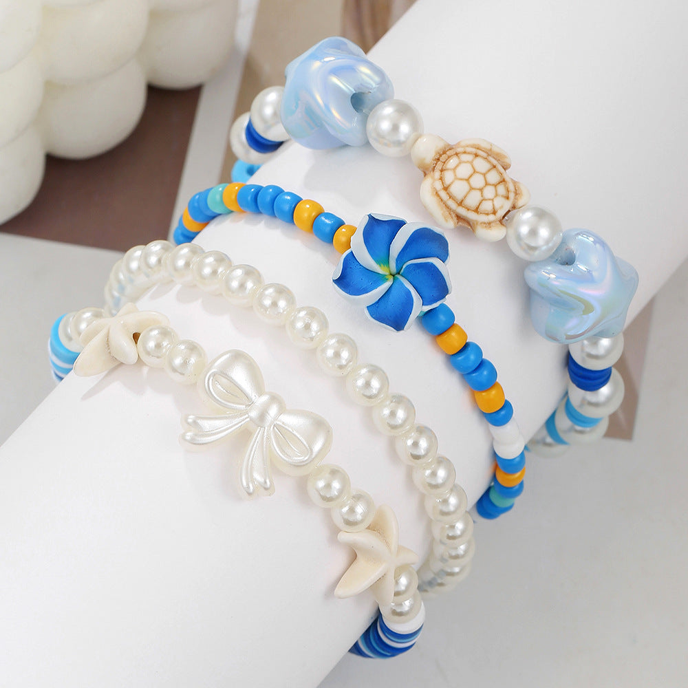 Bohemian Resin Beaded Bracelet with Turquoise Pearl Starfish Turtle and Bow Geometric Design