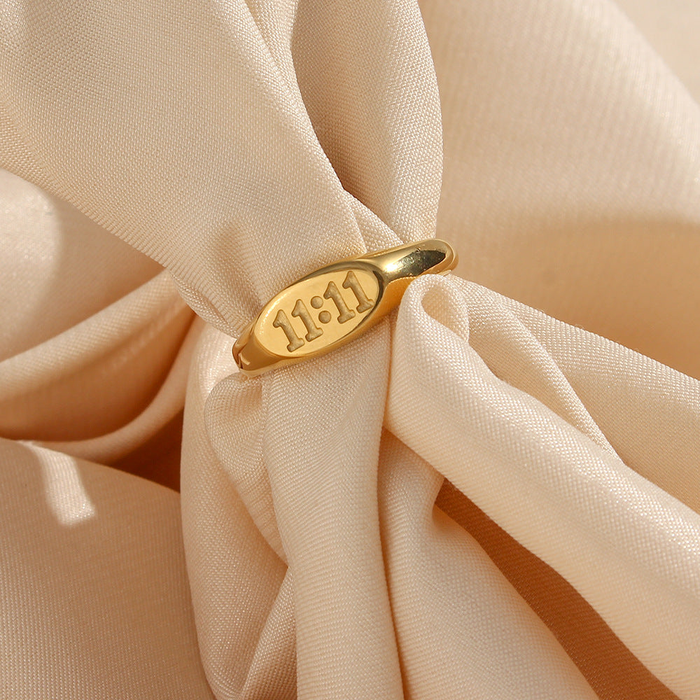 Anillo ovalado de acero inoxidable chapado en oro de 18 quilates minimalista para mujer con diseño numérico 11:11