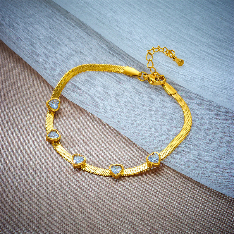 Juego de collar y pulsera minimalistas de acero de titanio con forma de corazón y cadena de serpiente con detalles de pedrería