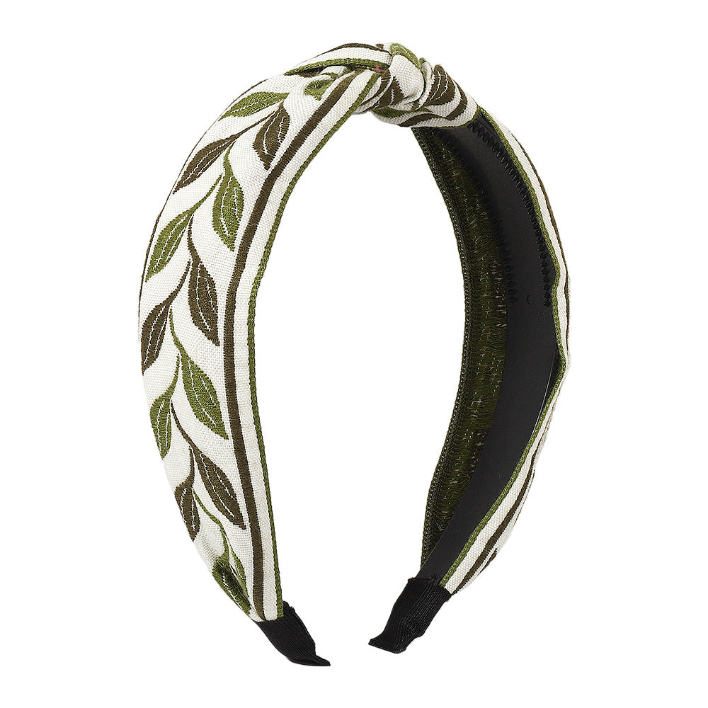 Diadema minimalista de tela para mujer con motivo floral y de hojas bordado
