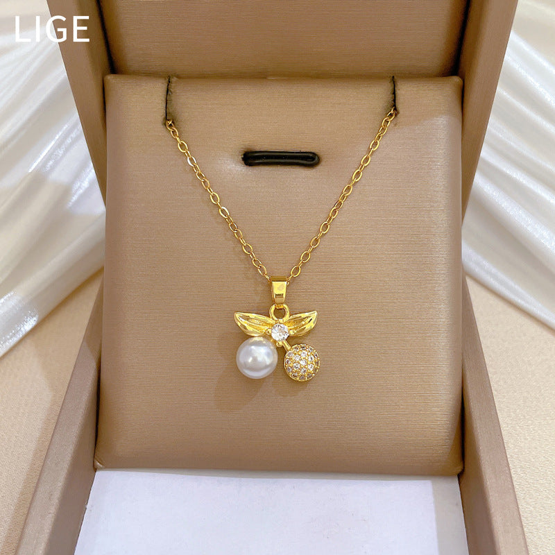 Set Minimalista di Collana e Orecchini a Ciliegia in Acciaio al Titanio con Intarsi di Strass da Donna