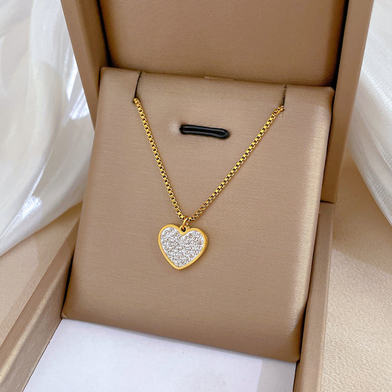 Collar con colgante de corazón de acero de titanio de lujo minimalista para mujer con baño de oro y diseño geométrico