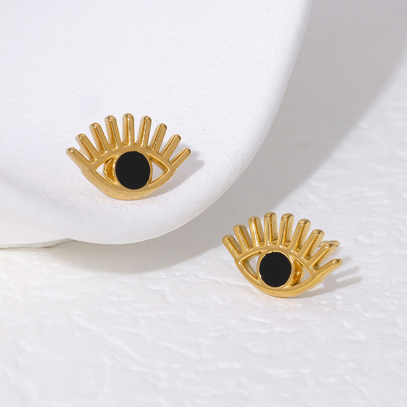 Pendientes de botón con forma de ojo de demonio atrevido de acero de titanio con chapado en oro de 18 quilates para mujer