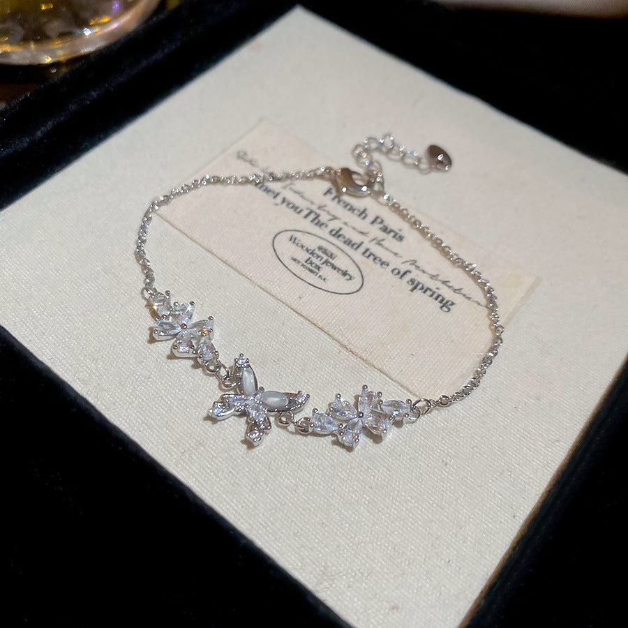Bracciale da donna placcato oro 18 carati con zirconi a forma di farfalla in stile lusso