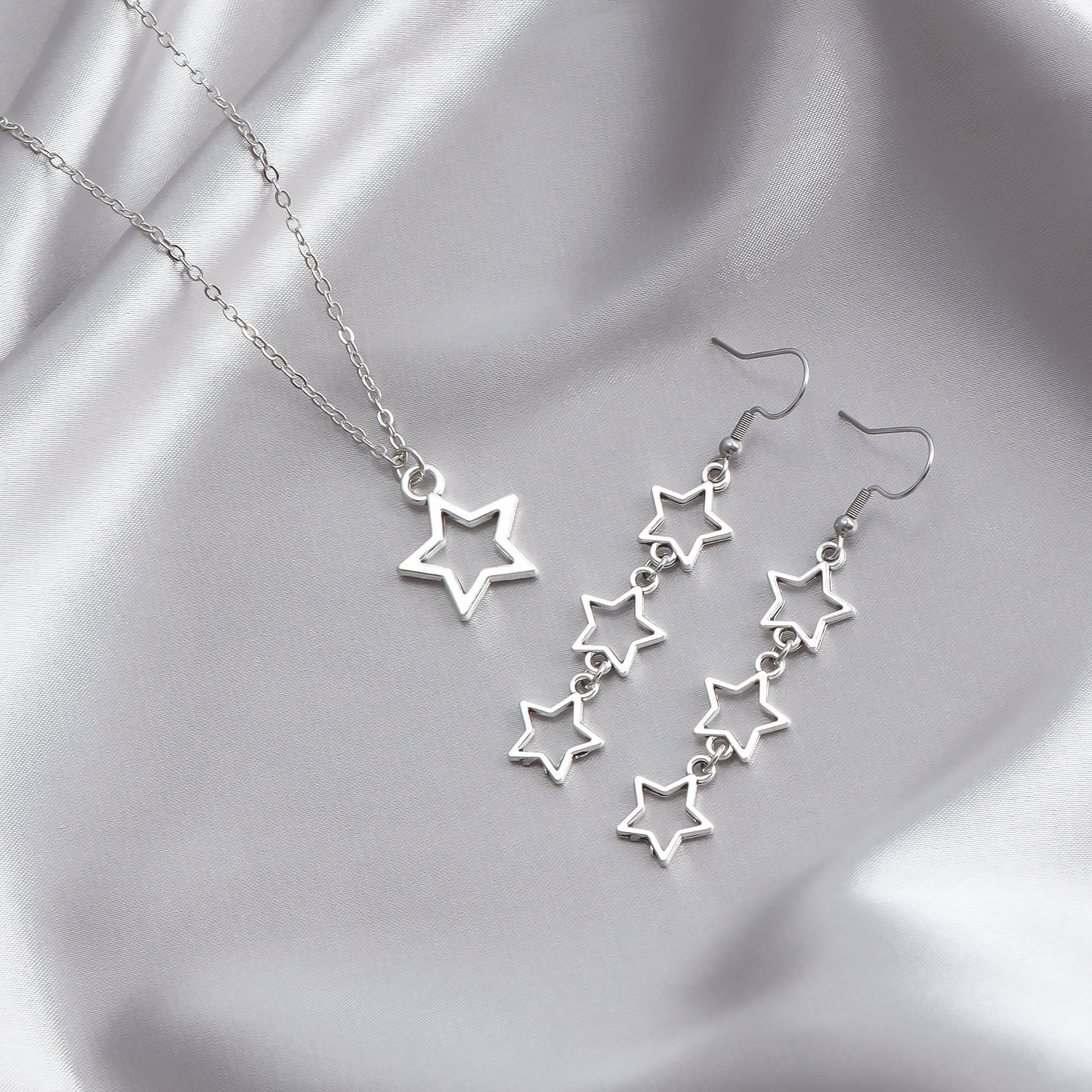 Pendientes de metal con forma de estrella calada, modernos y con acabado chapado, para mujer
