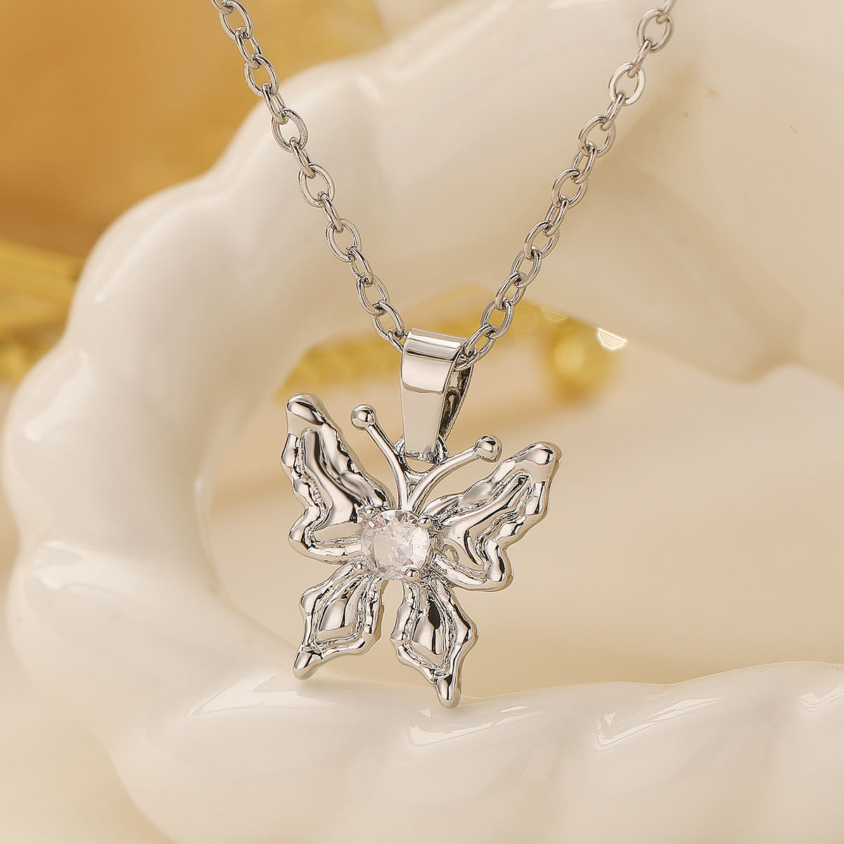 Minimalist Butterfly Pendant Necklace for Women Made of Brass with Rhinestone Inlay and Gold Plating