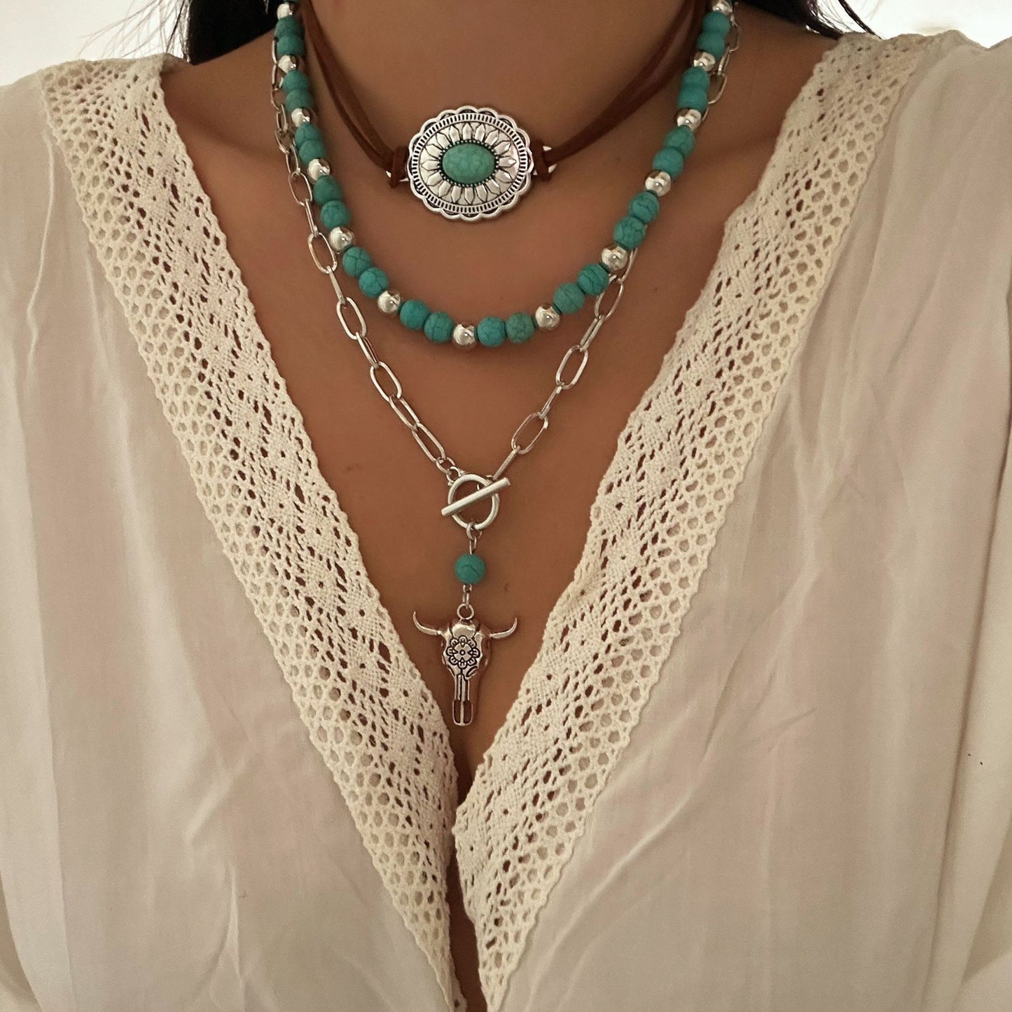 Collana con ciondolo in lega geometrico a croce a forma di testa di toro finta turchese etnica vintage da donna