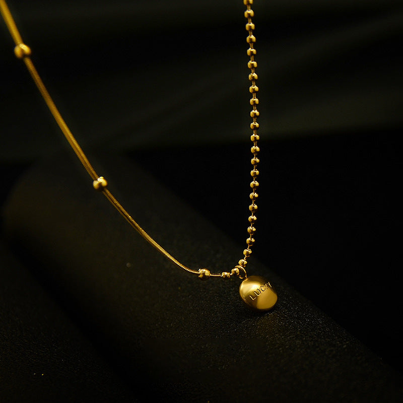 Minimalist Lucky Gold Bean Pendant Necklace in Titanium Steel with Gold Plating for Women and Men