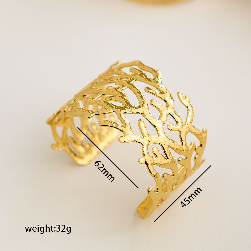 Bracciale Minimalista Ispirato alla Francia in Acciaio Inossidabile con Trafori a Motivi Floreali di Foglie e Girasoli