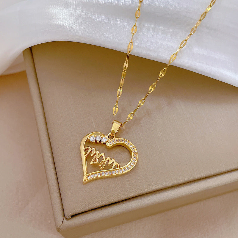 Elegant Hollow Heart Letter Floral Pendant Necklace for Women in Titanium Steel with Rhinestone Inlay and Delicate Clavicle Chain