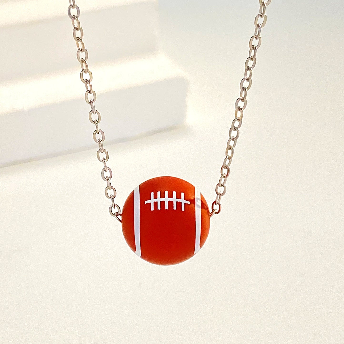 Collana con ciondolo sportivo geometrico in lega placcata per donna