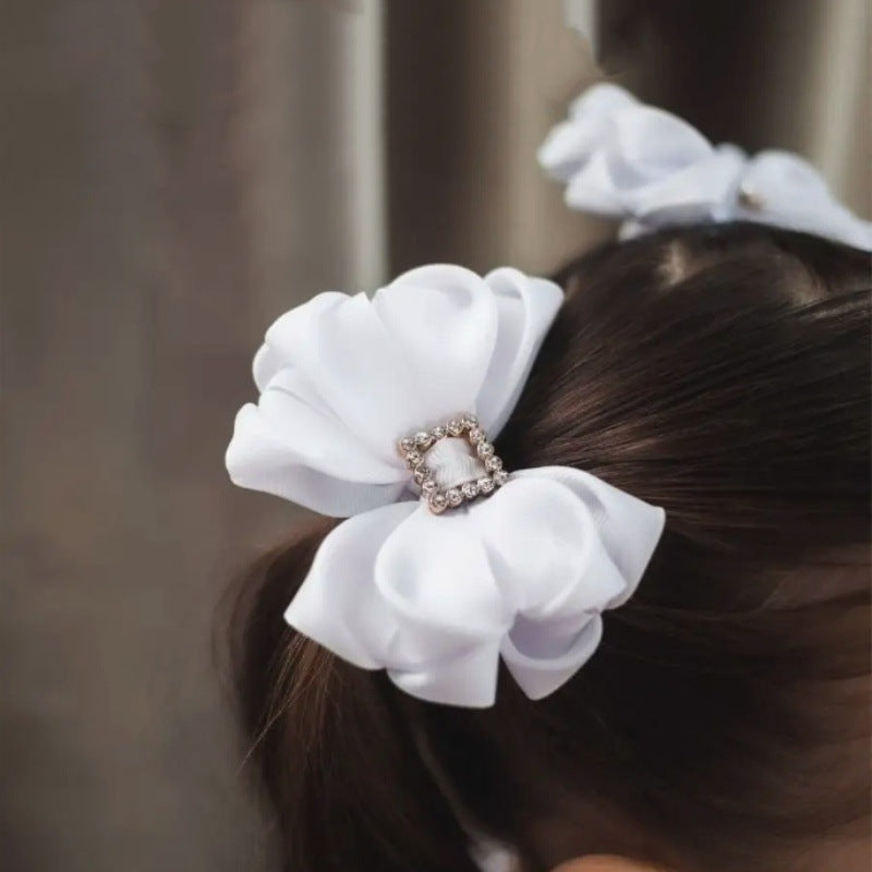 Deliziosa molletta per capelli a fiocco minimalista per bambini in tulle con texture arricciata e a rete