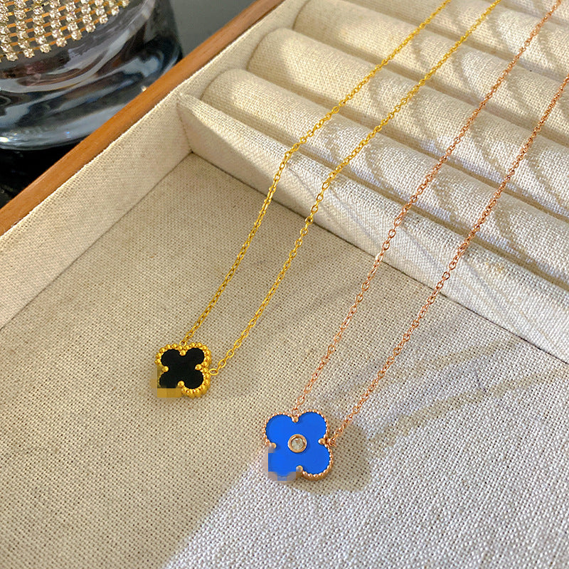 Blue Four-Leaf Clover Titanium Steel Necklace with 18K Gold Plated Double-Sided Black and White Pendant