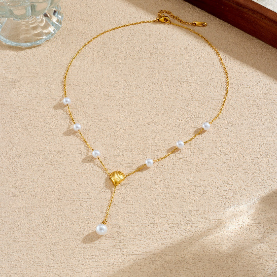 Elegant Gold Plated Stainless Steel Y-Chain Necklace with Seashell Pendant and Pearl Accent for Women