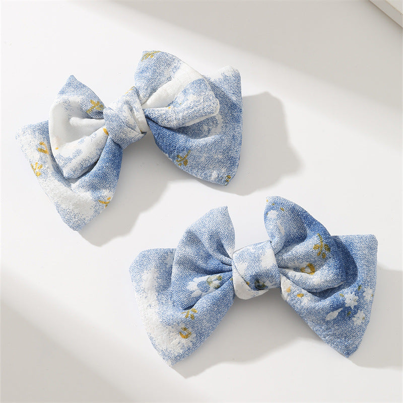 Set de pinzas para el cabello florales pastel dulces para niñas con diseño de tela en forma de moño en estilo ligero de lujo