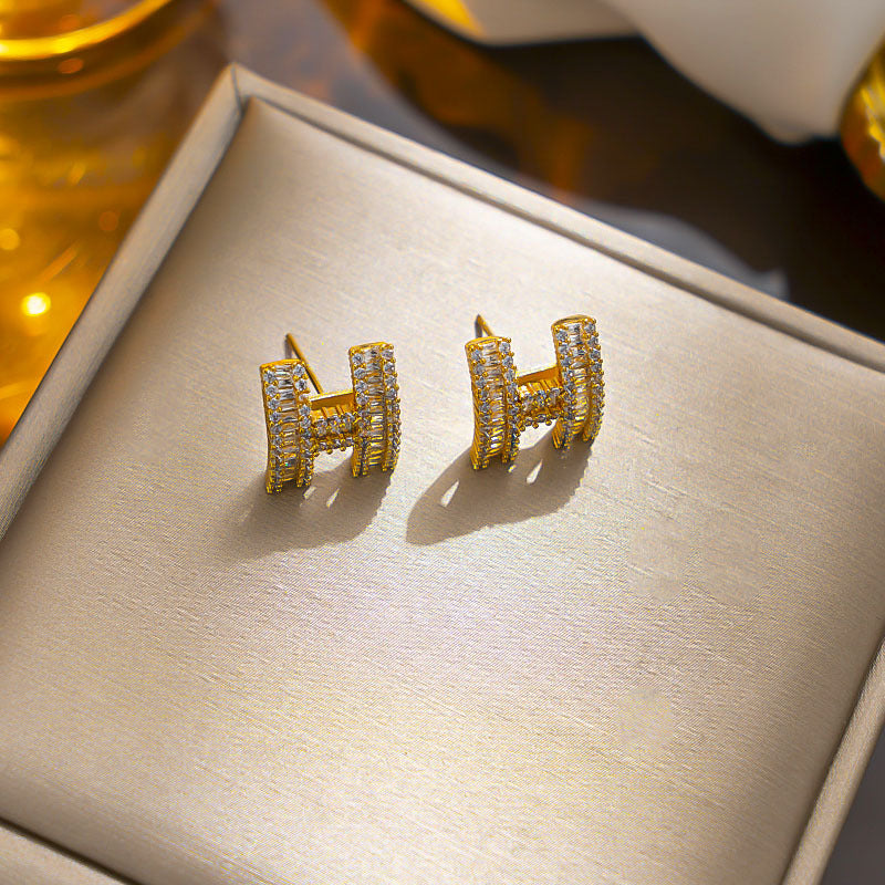 Cartoon Style Letter H Shaped Zirconia Stud Earrings for Women in Copper with Elegant Minimalist Aesthetic