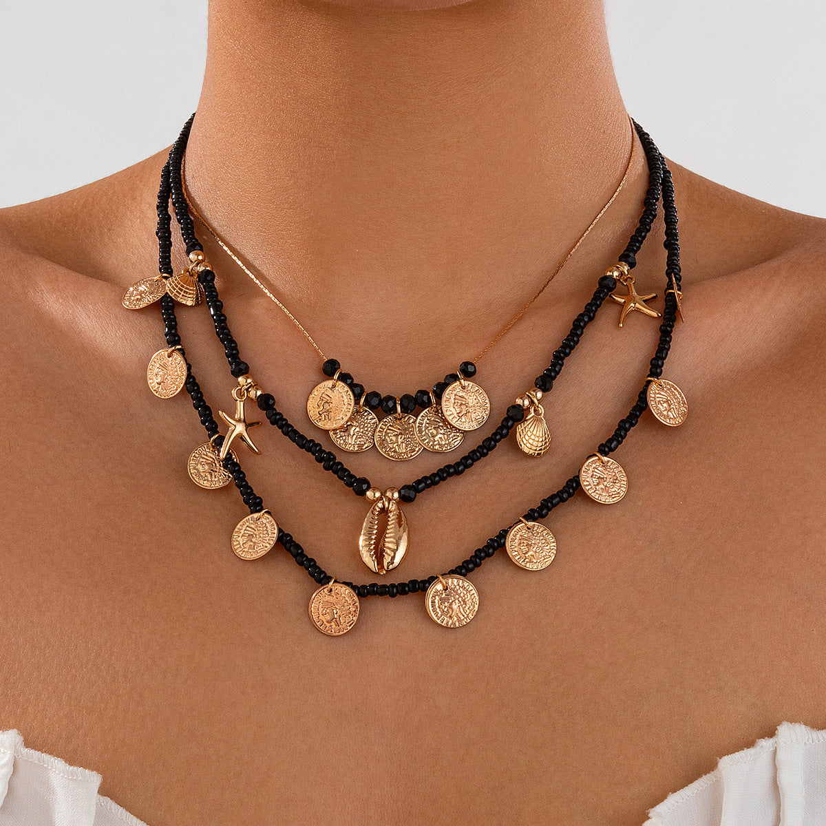 Collana con ciondolo a moneta in stile bohémien vintage in lega placcata su catena di perline da donna