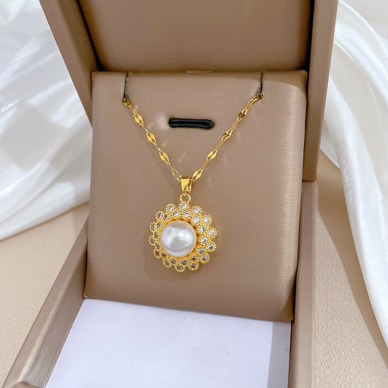Collana con pendente minimalista a nido con perle e strass in acciaio al titanio con design geometrico per donna e uomo