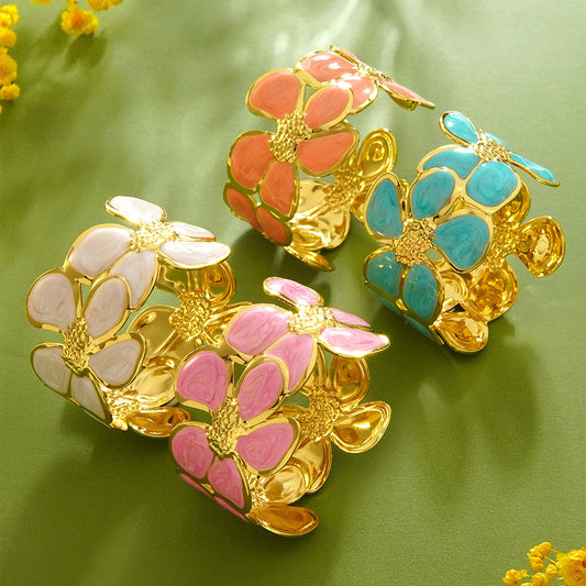 Pulsera de esclava informal de acero de titanio con diseño floral y aceite goteante