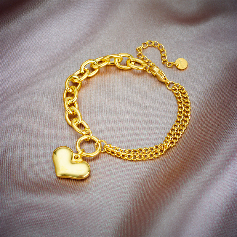 Braccialetto placcato in acciaio al titanio a forma di cuore, vintage e minimalista, con design geometrico, per uomo e donna