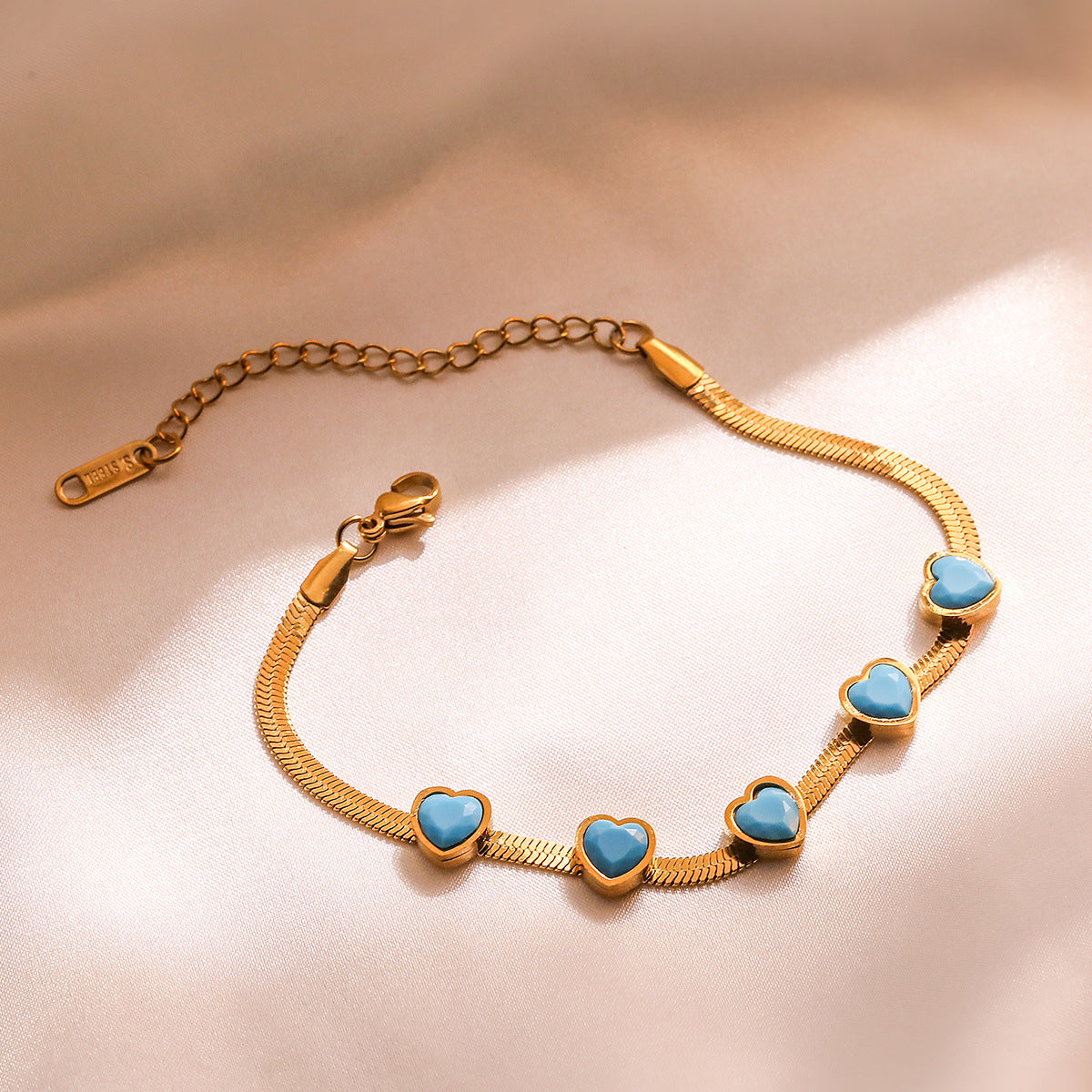 Bracciale da donna in acciaio al titanio, geometrico minimalista, placcato oro e con intarsio in turchese