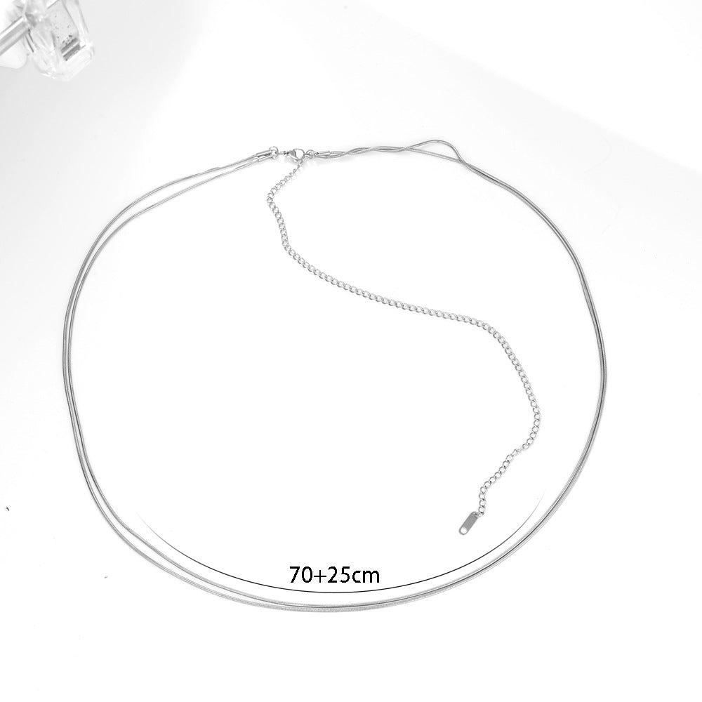 Cadena de cintura de doble capa de acero inoxidable con cadena de serpiente minimalista atrevida para mujer