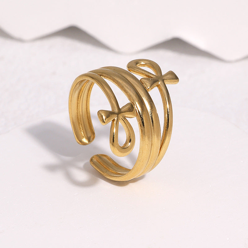 Anello aperto minimalista da donna in acciaio inossidabile placcato oro 18 carati, con fiocco geometrico