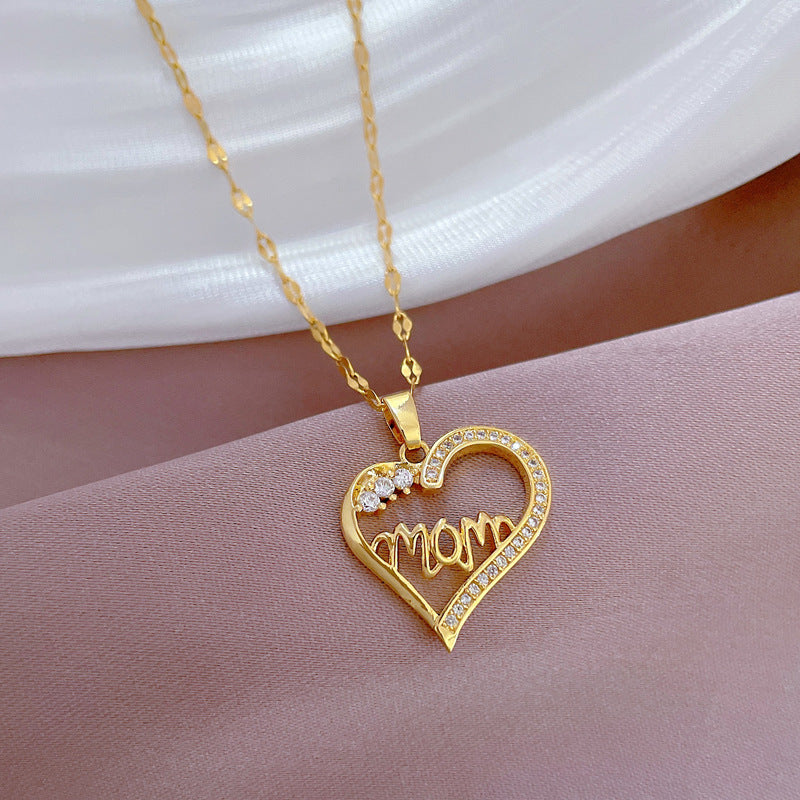 Elegant Hollow Heart Letter Floral Pendant Necklace for Women in Titanium Steel with Rhinestone Inlay and Delicate Clavicle Chain