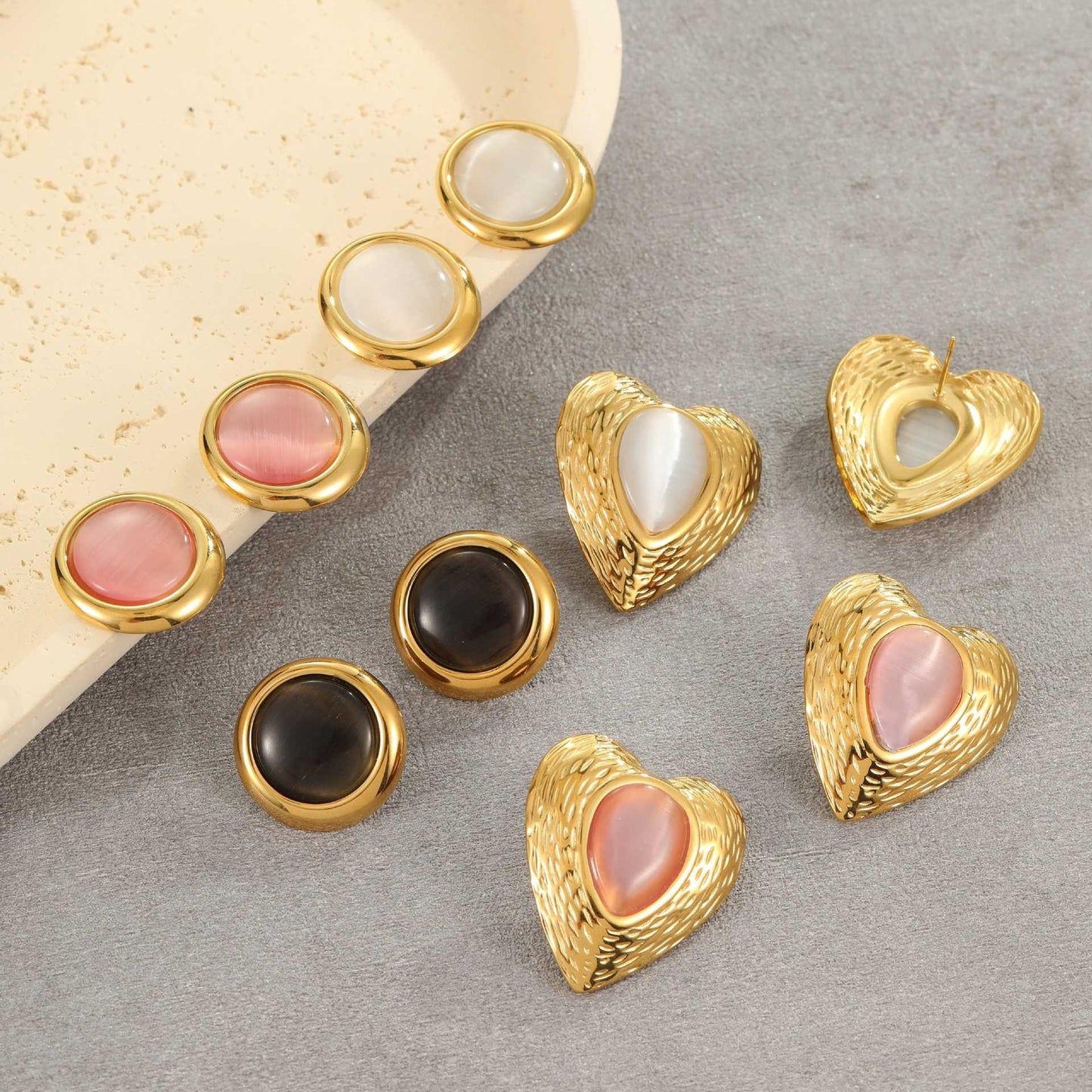 Pendientes de acero de titanio con forma de corazón de moda con incrustaciones de ojo de gato y acabado galvanizado para mujer